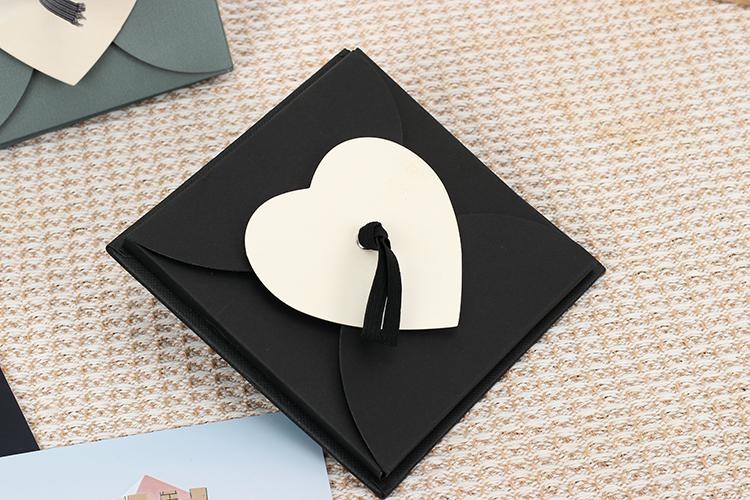 photo album with black paper