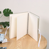 photo album with paper between pages
