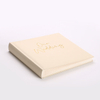 photo album with paper between pages
