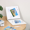 different photo album with paper quotes inserts