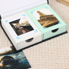 photo album with paper between pages
